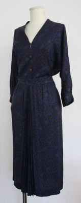 an image of a woman ' s dress on a mannequin stand