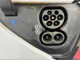 a close up of a car ' s plugged in the trunk