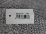 the label is on the back of a jacket that has a barcode on it