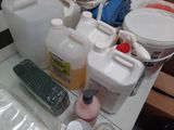 many different types of cleaning supplies on the counter