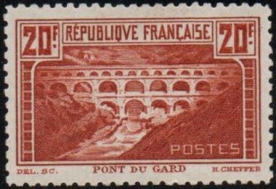 a stamp with a picture of a bridge on it