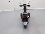 a motorcycle that is parked in a garage