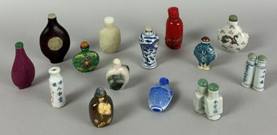 a lot of small vases that are sitting on a table