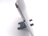a close up of a tablet computer on a stand