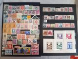 a lot of stamps on the table and on the table