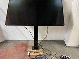 an image of a flat screen tv sitting on the floor
