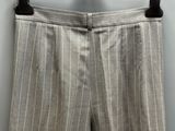 a close up of a pair of pants hanging on a hanger