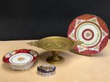 several different types of plates and bowls are on a table
