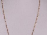 a gold chain necklace on a mannequin mannequin mannequin mannequin mannequin mannequin mannequin mannequin manne