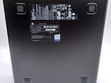 the back of a laptop with a battery attached to it