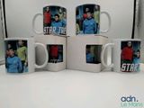 quatre tasses à café Star Trek empilées les unes sur les autres