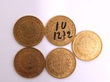 four gold coins with the names of different countries on them