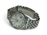 a silver watch with roman numerals on the bracelet