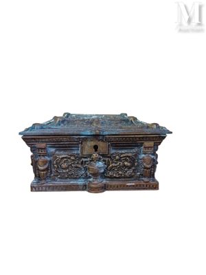 an old wooden box with carvings and carvings on it