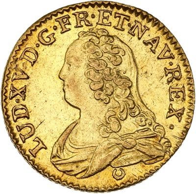 une pièce d'or « sovereign » sur laquelle figure la tête d'une femme