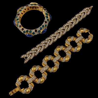 a collection of jewelry including a bracelet, bracelet and ring