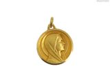 l'image d'une pièce d'or sur laquelle figure le visage d'une femme