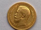l'image d'une pièce d'or sur laquelle figure le visage d'un homme