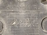 a close up of a metal plate with a number on it