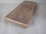 a brown case sitting on top of a table