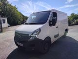 a picture of a white van parked in a parking lot