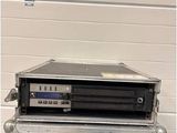 a black and silver case with a cd player on top of it