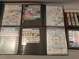 a lot of different stamps on the pages of a binder