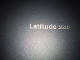 the back of a black laptop with the word latitude 350 written on it