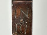 a close up of a metal object with a sign on it