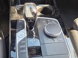 an image of a car dashboard with a cell phone in the center