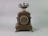 a clock that is sitting on top of a table