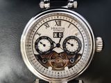 a close up of a wrist with a watch on it