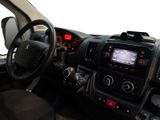 a dashboard of a car with a steering wheel and dashboard controls