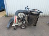 a small machine that is sitting on the ground