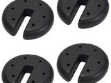 quatre butoirs de porte en plastique noir sur fond blanc