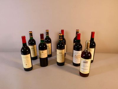 several bottles of wine are lined up on a table