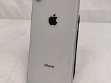 a close up of the back of an iphone with a white background