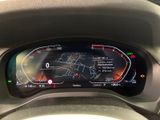 the dashboard of a car with a digital display on it