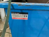 a blue container that has a sticker on it
