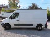 a white van that is parked in a parking lot