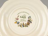 a white plate with a floral design on it