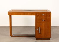 Bureau moderniste en bois de placage et métal chromé.