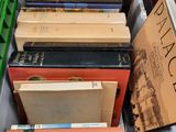 a lot of books that are sitting on a tray