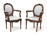 pair of carved wood chairs with blue upholstered upholstered upholstered upholstered upholstered upholstered upholstered