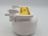 a close up of a small white object on a white surface
