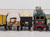 a toy train that is sitting on a white surface