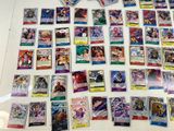 a collection of pokemon trading cards displayed on a table