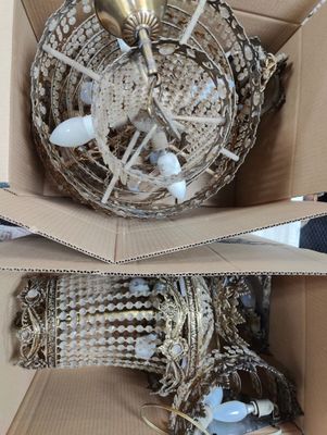 a box with a bird inside of it and a box with a bird inside of it