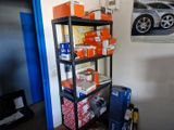 a shelf that has many different types of items on it