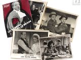 several black and white photos of men and women on a table